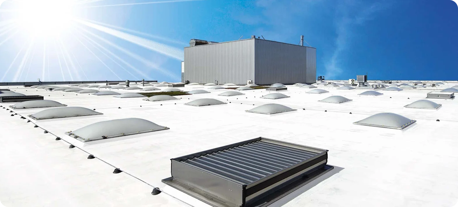 Are there paints that reduce roof heat build-up?